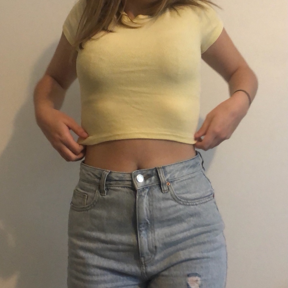 yellow cropped me to we pacsun shirt
